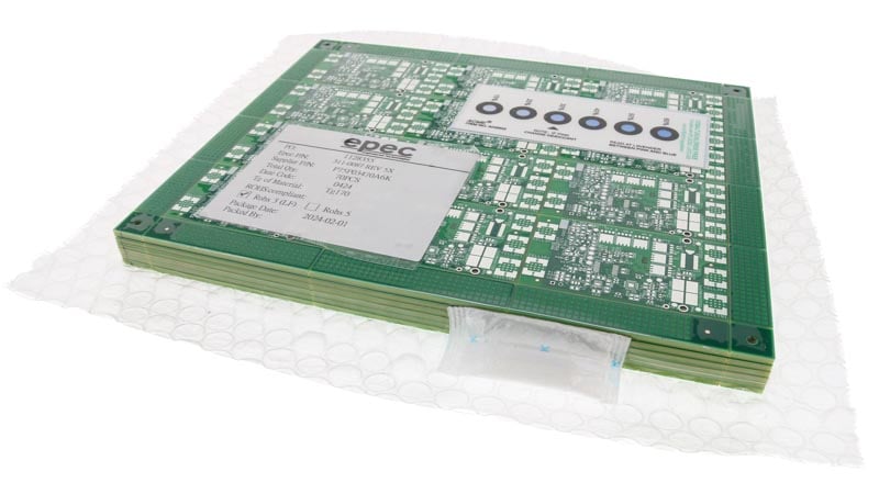 Printed circuit boards packaged with humidity indicator