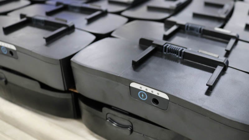 Custom battery packs that are manufactured for a portable device