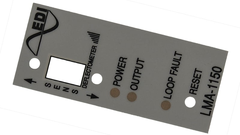 Graphic overlay with smoke colored LED windows to attenuate the brightness
