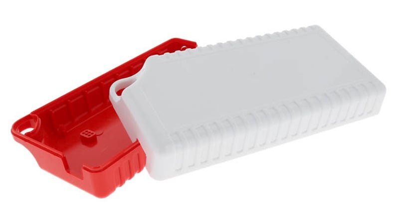 Injection molded housing with red color matching