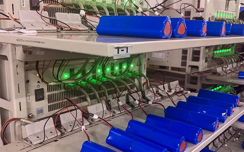 Lithium battery packs charging at charging station