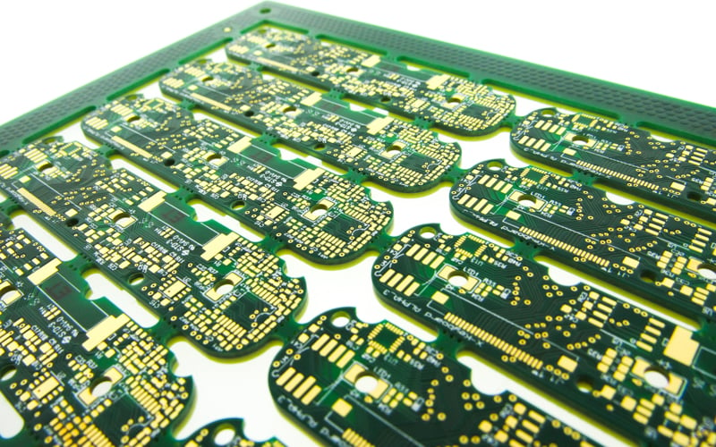 PCBs with rounded routing features