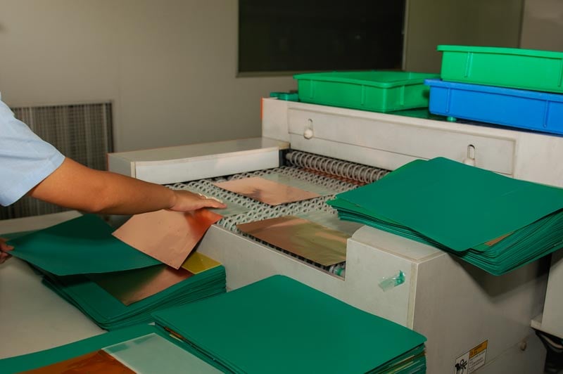 Processing flexible PCB materials before dry film application and etching