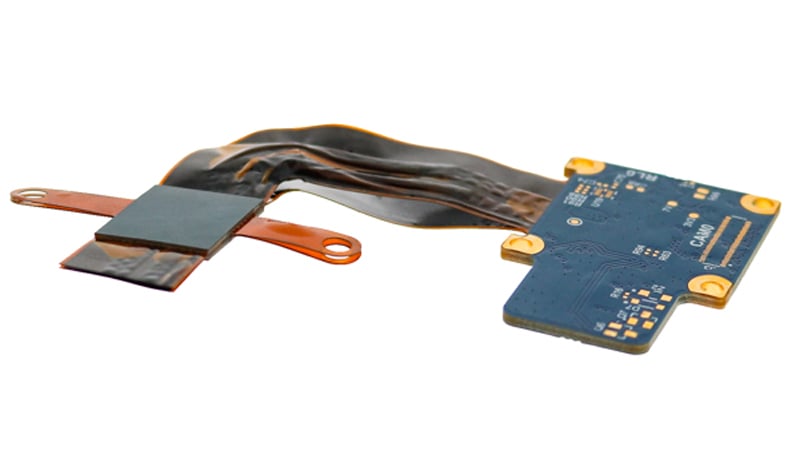 A rigid-flex circuit board that has experienced catastrophic failure and delamination due to improper baking and assembly procedures