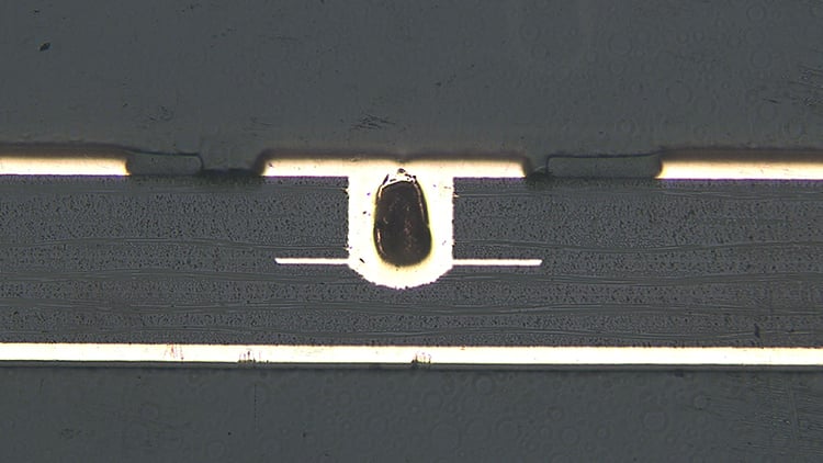 Example of unfilled mechanical depth drilled microvia