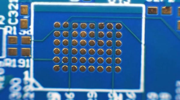 Printed circuit board with via in pad