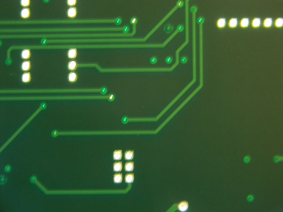 Tenting Vias of a Printed Circuit Board Under a Microscope