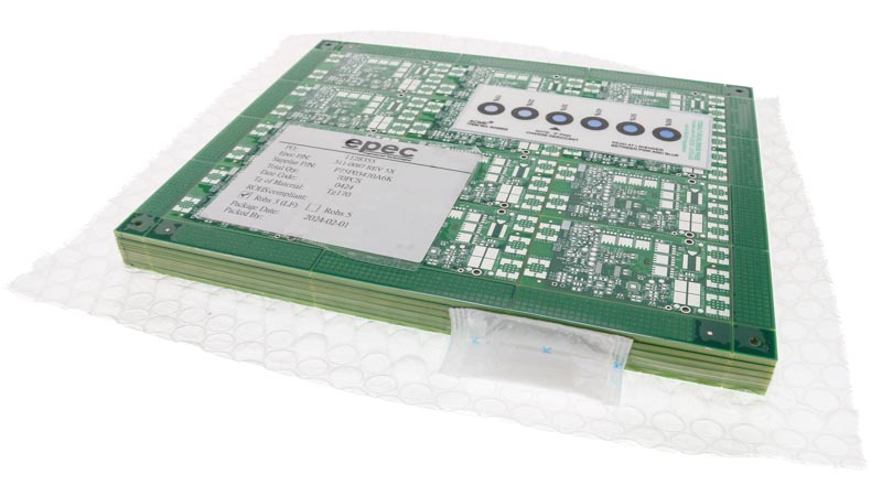 Printed circuit boards packaged with humidity indicator