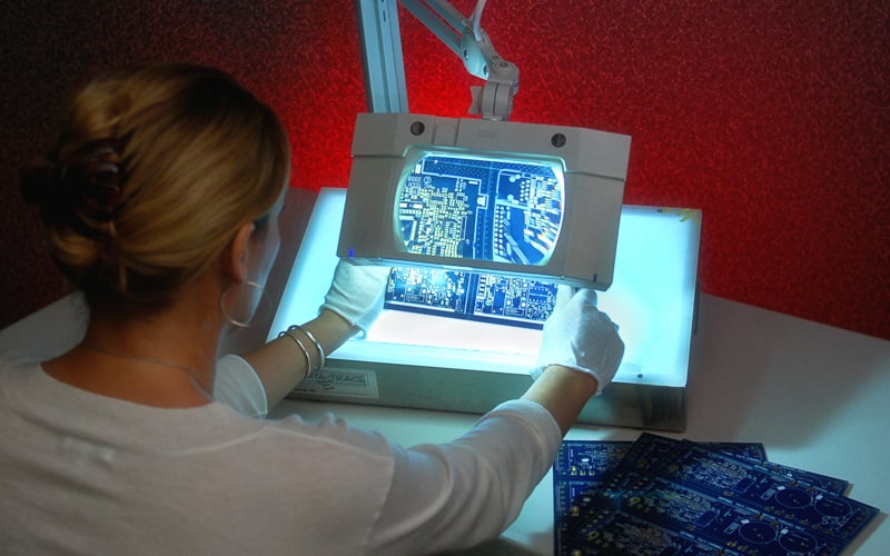Visual inspection of PCBs under a microscope